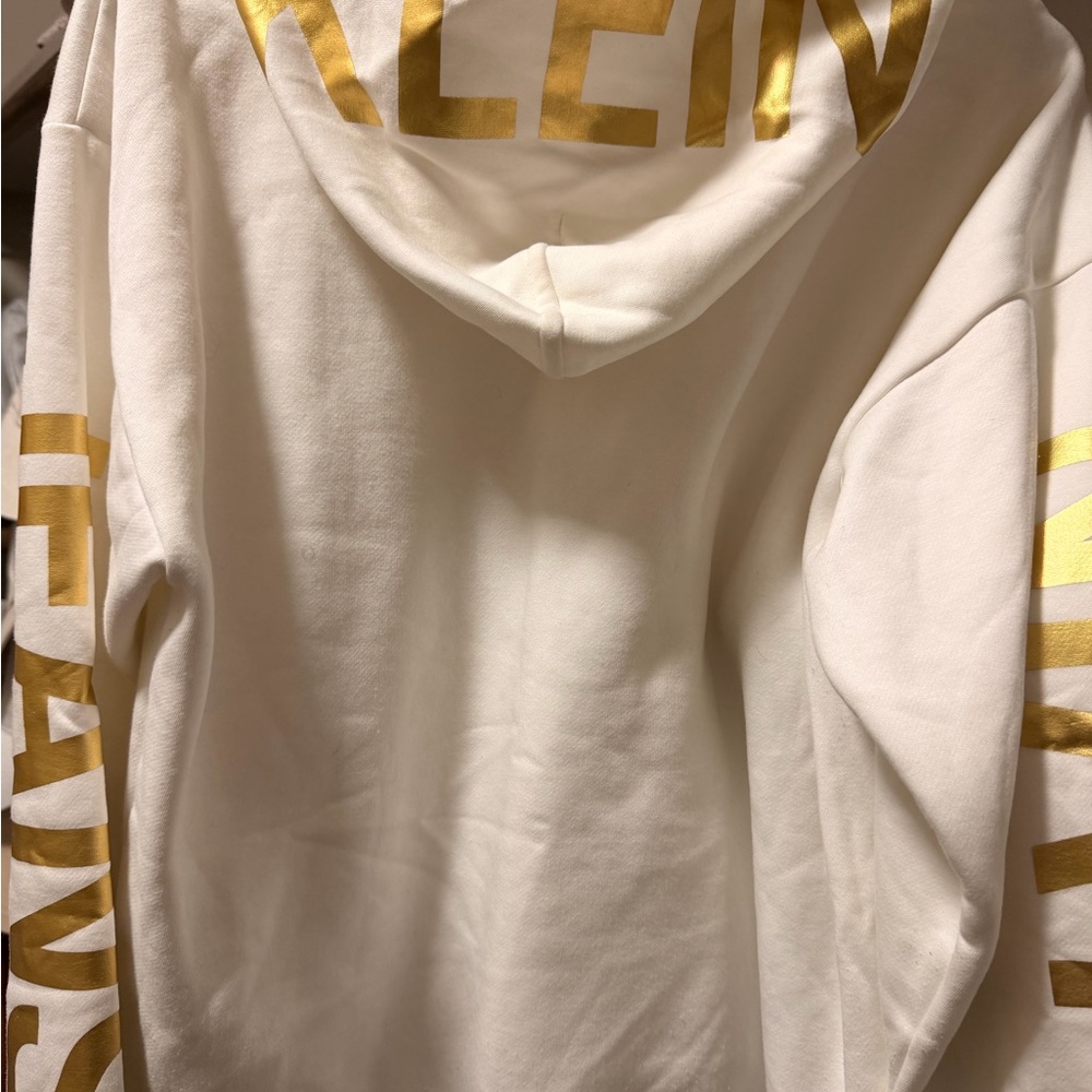 Calvin Klein Cream Hoodie with Gold Accents